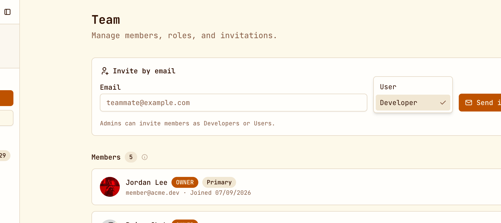 The role dropdown open in the invite form